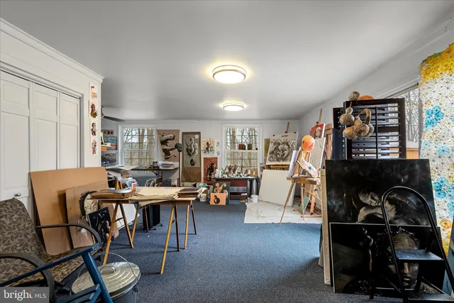 a view of a livingroom with furniture and a chair