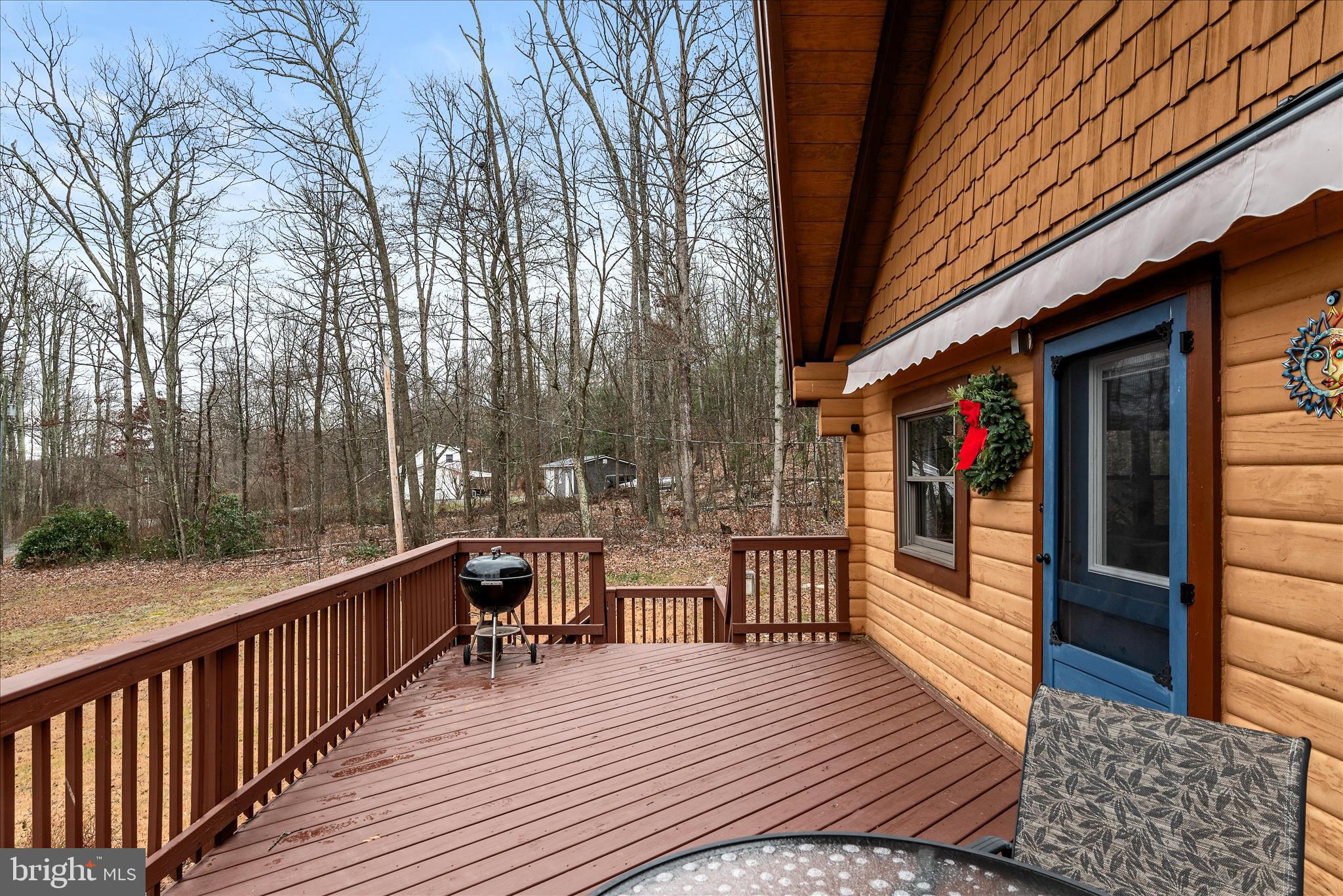 249 Crestview Lane Berkeley Springs, WV 25411 - Photo 34 of 52 a view of a house with wooden deck