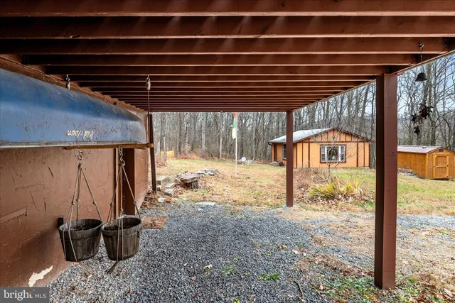 a view of a chairs on the roof deck