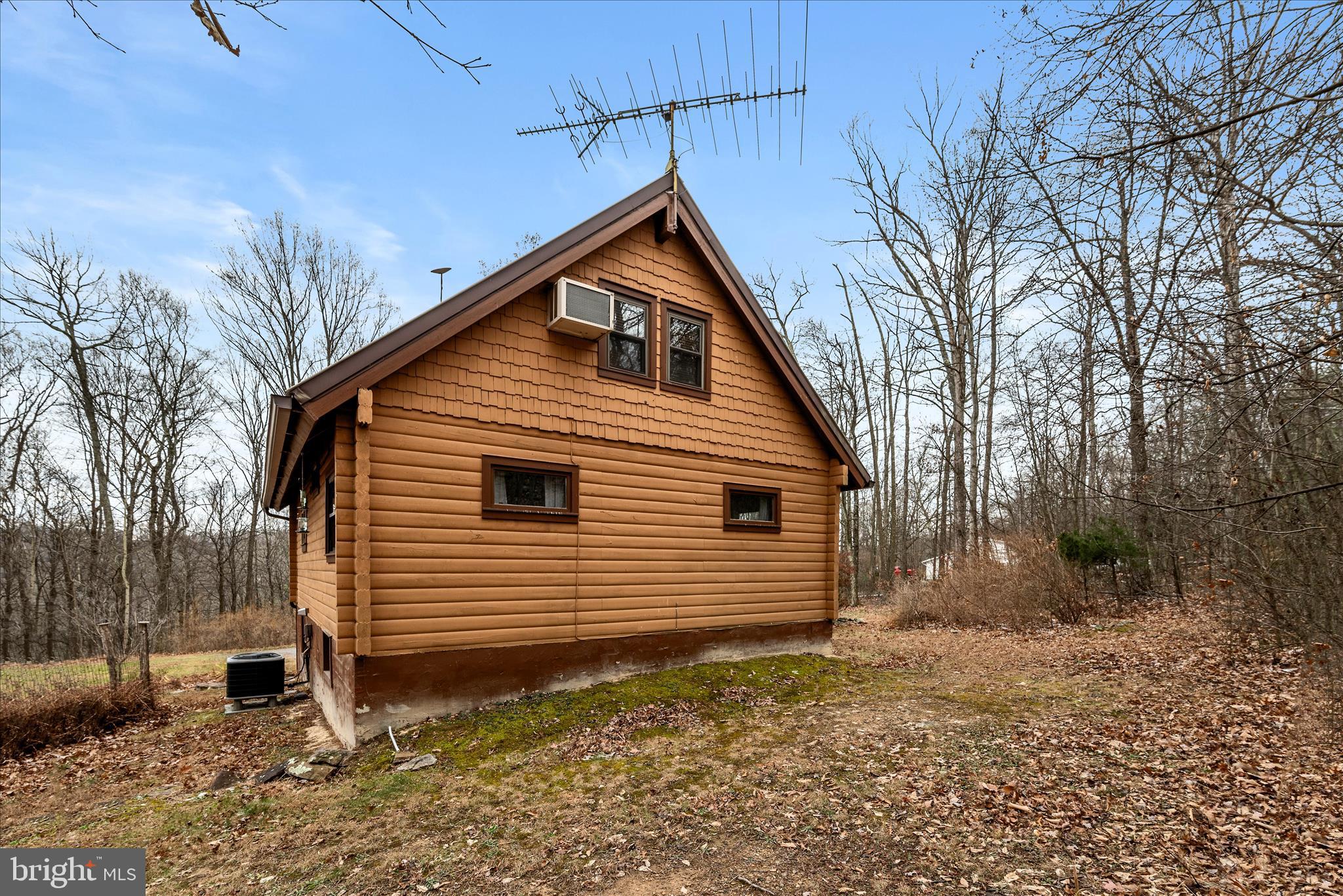 249 Crestview Lane Berkeley Springs, WV 25411 - Photo 41 of 52 a view of house with a yard