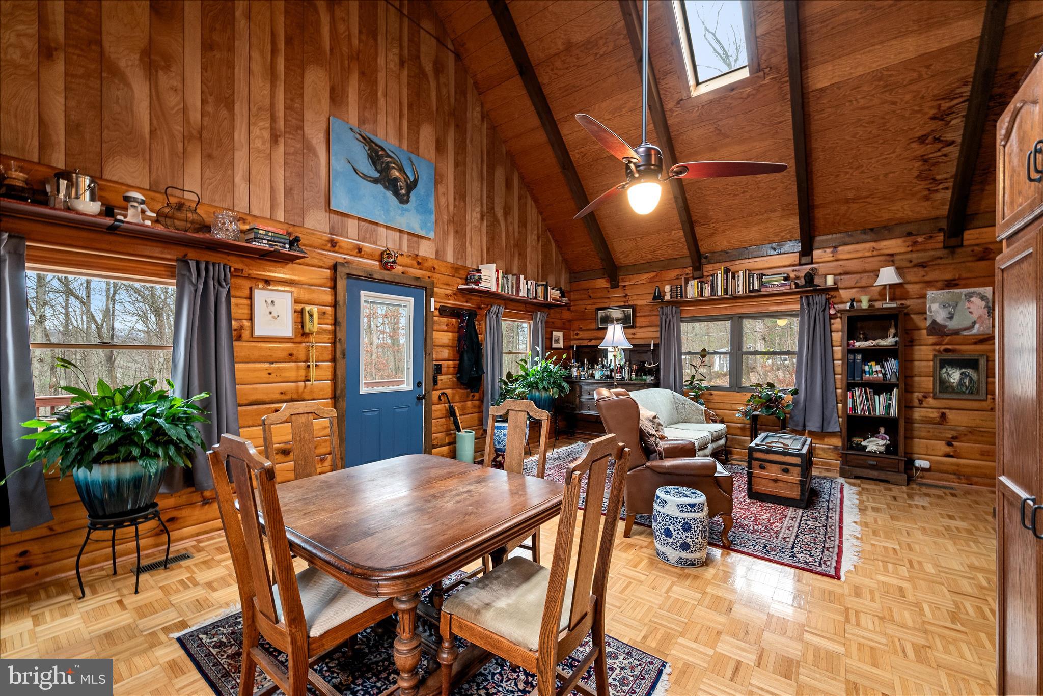 249 Crestview Lane Berkeley Springs, WV 25411 - Photo 7 of 52 a view of a chairs and table in a patio