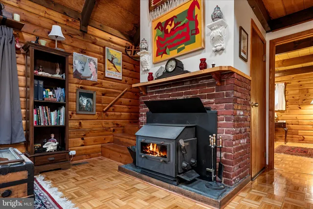 a view of a fireplace with shelves