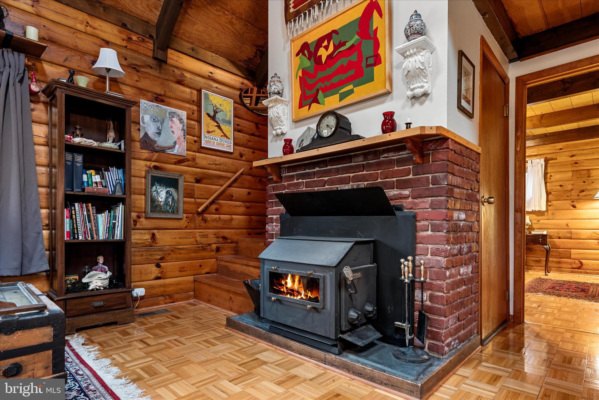 249 Crestview Lane Berkeley Springs, WV 25411 - Photo 10 of 52 a view of a fireplace with shelves