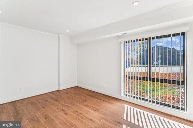 a view of a livingroom with wooden floor