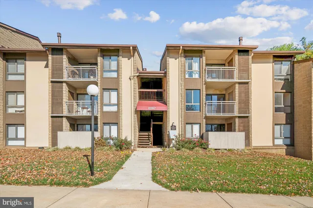 a front view of multi story residential apartment building