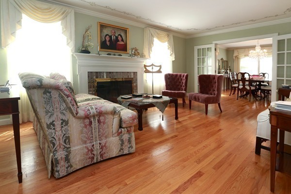 65 Boren Lane Boxford, MA 01921 - Photo 14 of 28 a living room with furniture and a fireplace
