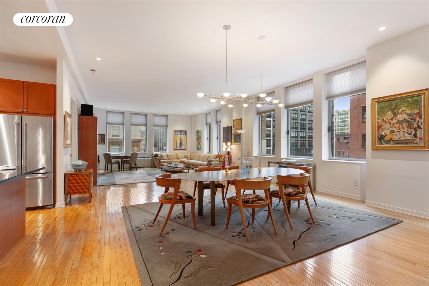 252 7th Avenue, Unit 4P Manhattan, NY 10001 - Photo 1 of 1 a view of a dining room with furniture window and wooden floor