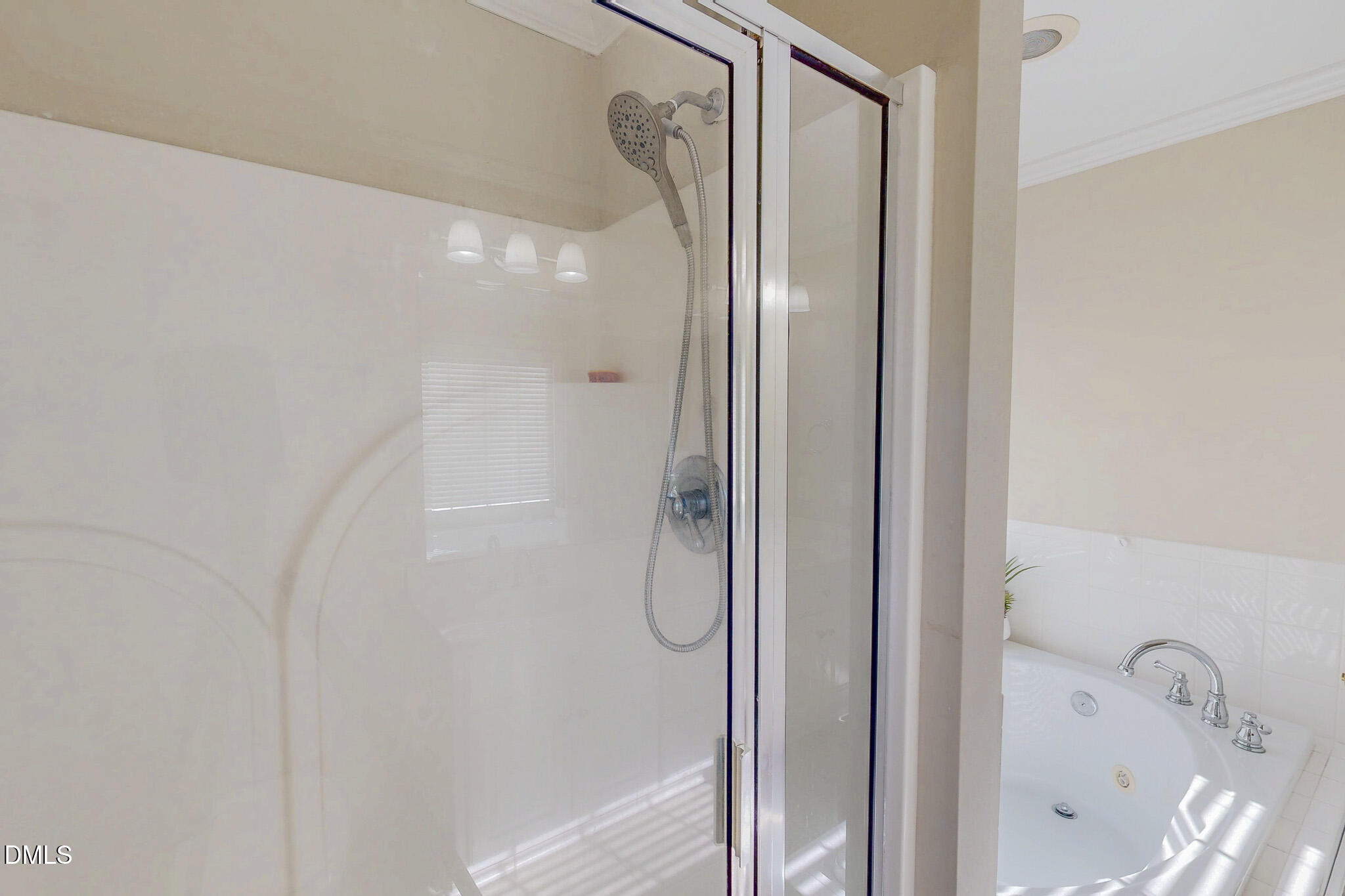 70 Younger Road Roxboro, NC 27573 - Photo 16 of 45 a bathroom with a glass shower door