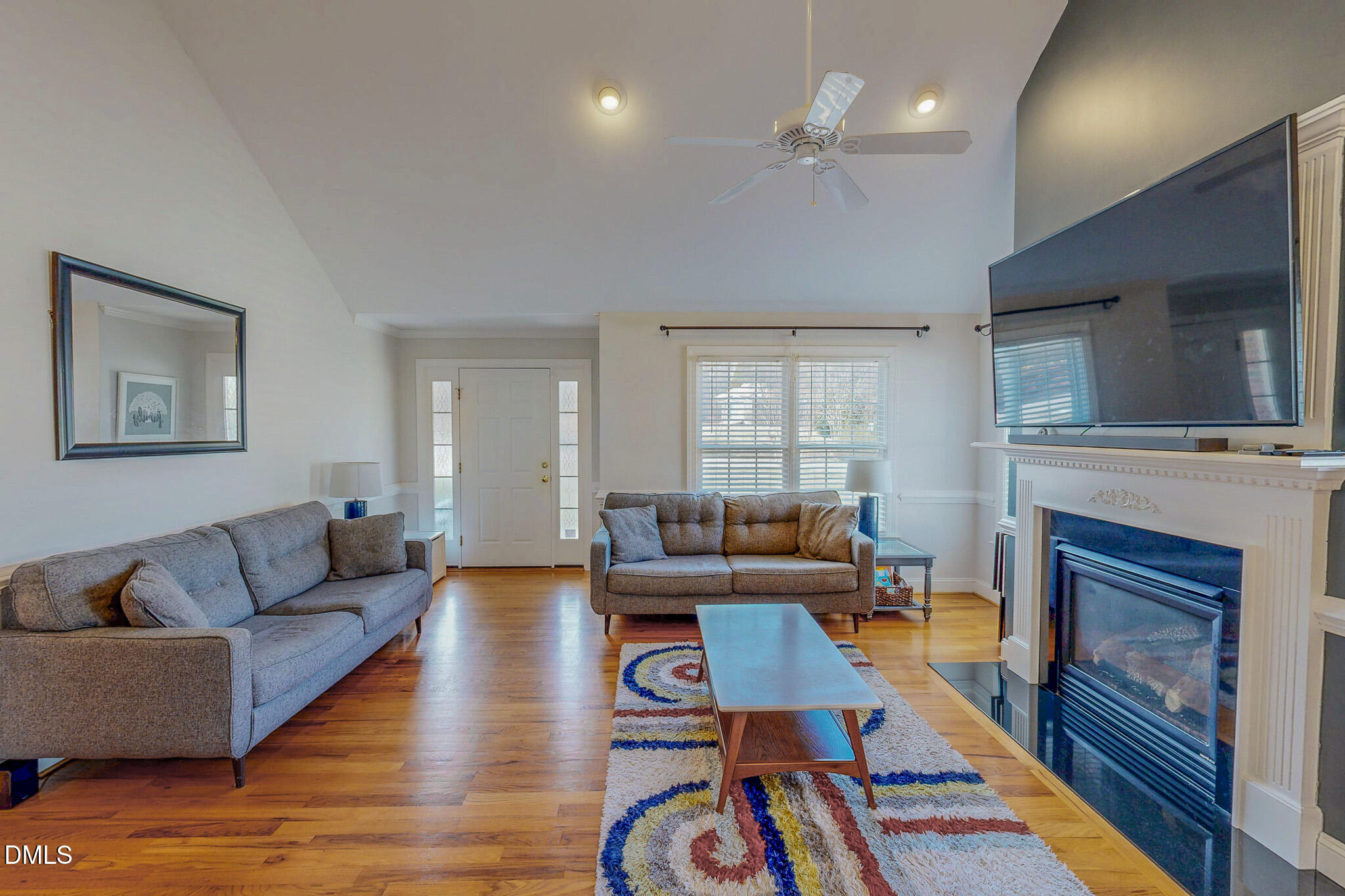 70 Younger Road Roxboro, NC 27573 - Photo 17 of 45 a living room with furniture fireplace and flat screen tv