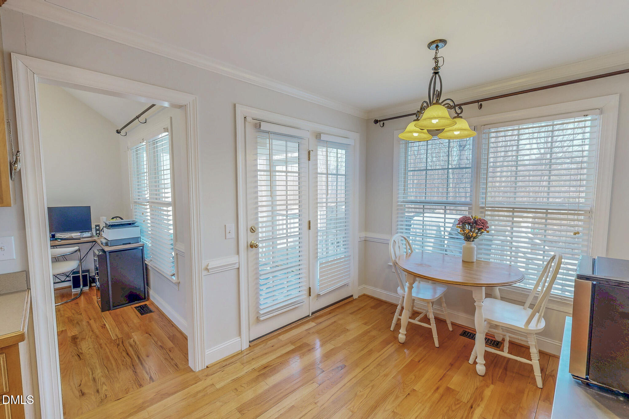 70 Younger Road Roxboro, NC 27573 - Photo 22 of 45 a view of a dining room with furniture window and wooden floor