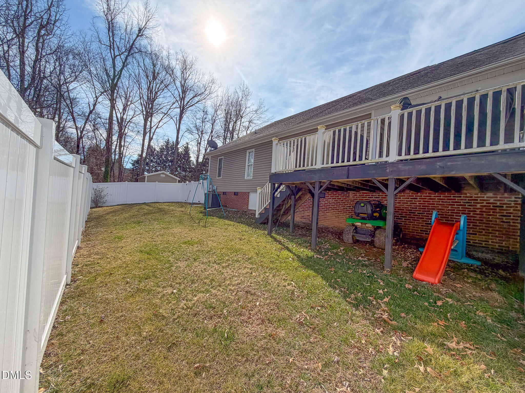 70 Younger Road Roxboro, NC 27573 - Photo 28 of 45 a view of a backyard with a large tree