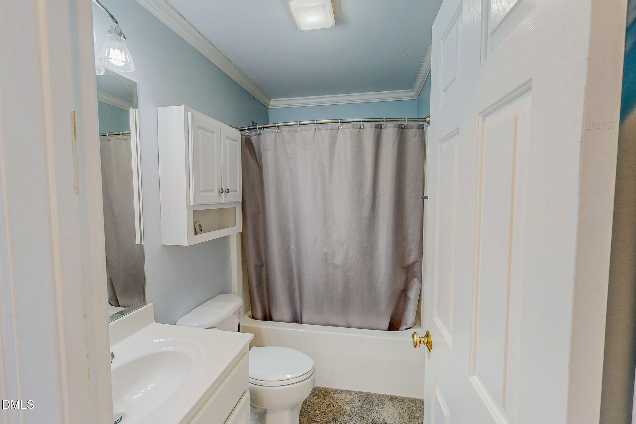 70 Younger Road Roxboro, NC 27573 - Photo 33 of 45 a white toilet sitting next to a bathroom sink