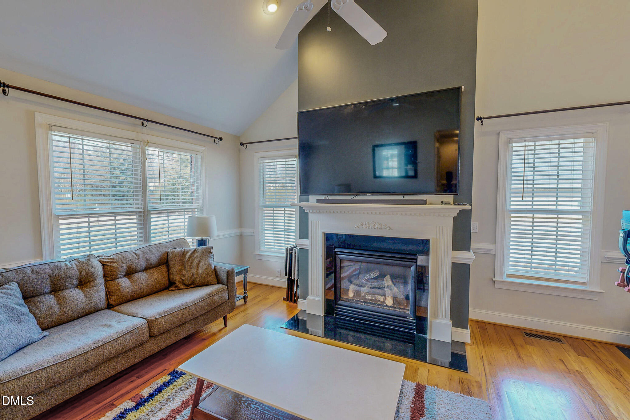 70 Younger Road Roxboro, NC 27573 - Photo 38 of 45 a living room with furniture and a fireplace