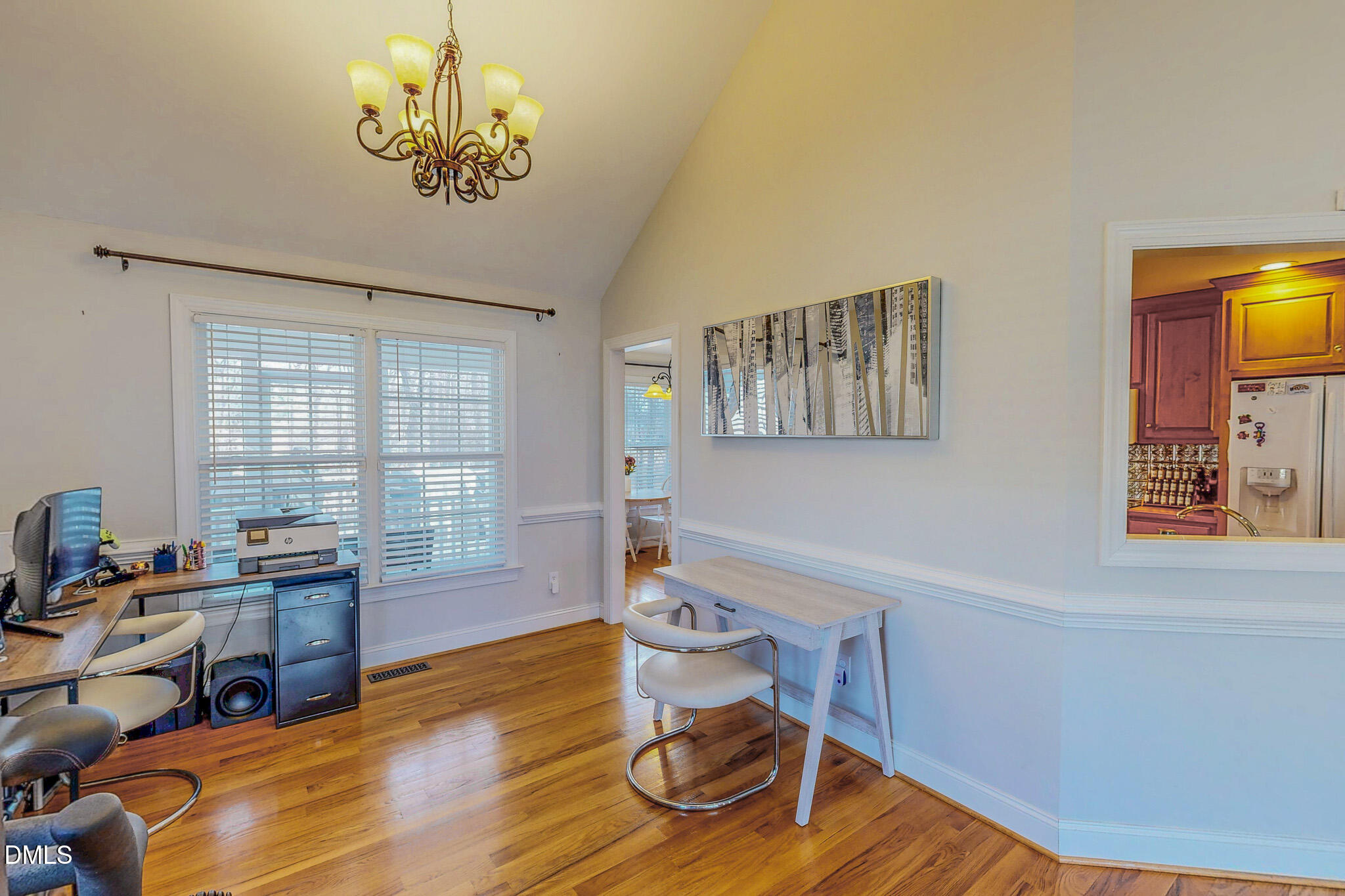 70 Younger Road Roxboro, NC 27573 - Photo 43 of 45 a view of a dining room with furniture a chandelier and wooden floor