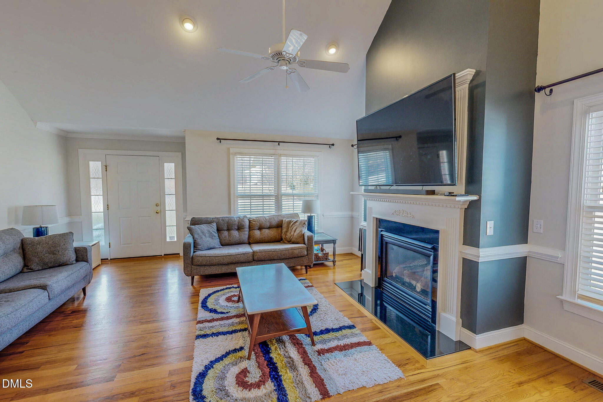 70 Younger Road Roxboro, NC 27573 - Photo 5 of 45 a living room with furniture fireplace and flat screen tv