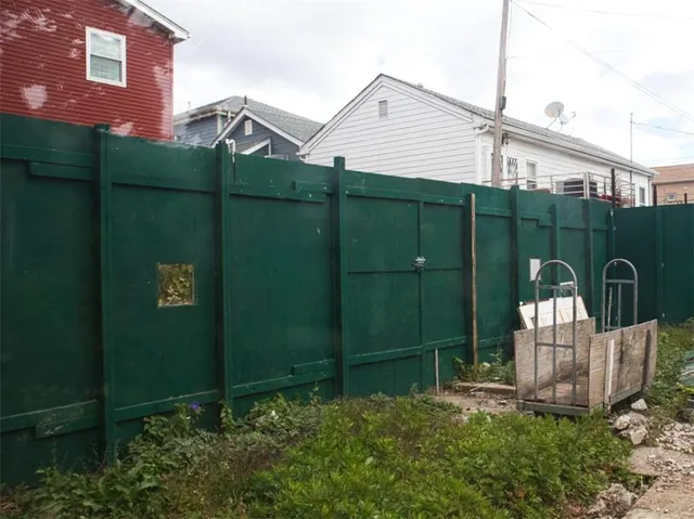 a view of a house with a small yard