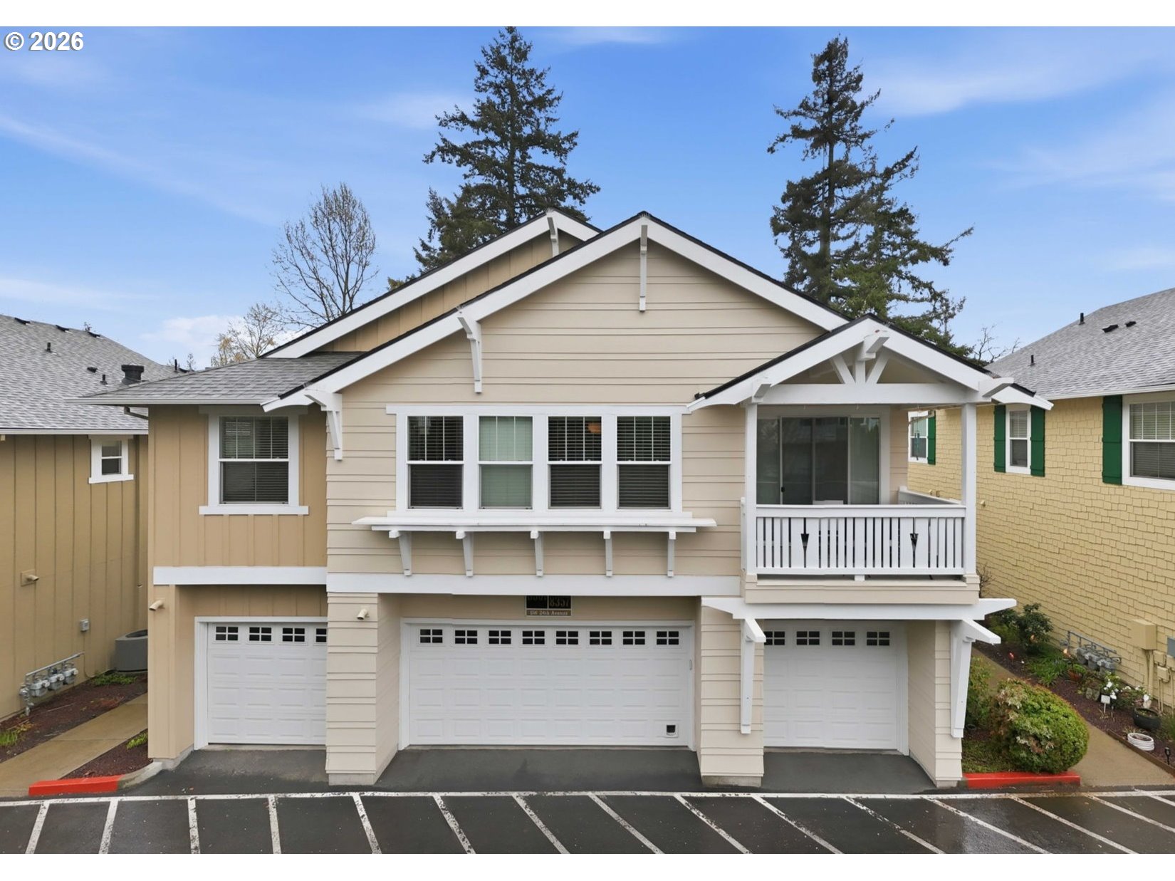 8361 Southwest 24th Avenue Portland, OR 97219 - Photo 1 of 39 a view of a large white building with many windows
