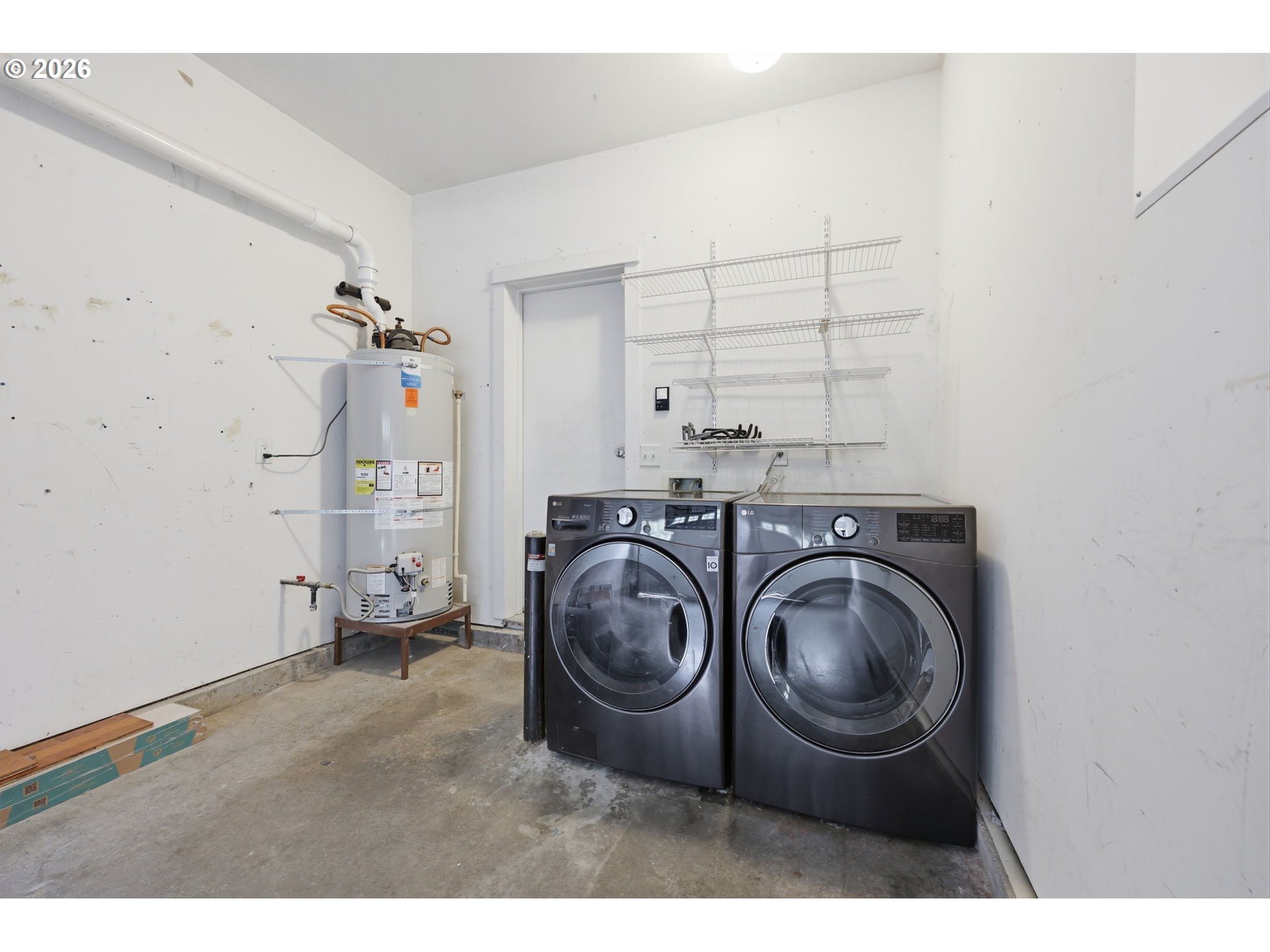 8361 Southwest 24th Avenue Portland, OR 97219 - Photo 28 of 39 a utility room with dryer and washer