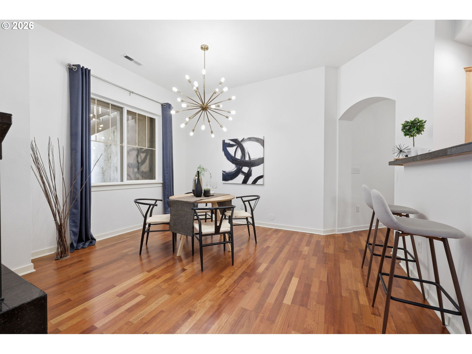 8361 Southwest 24th Avenue Portland, OR 97219 - Photo 8 of 39 a view of a dining room with furniture and wooden floor