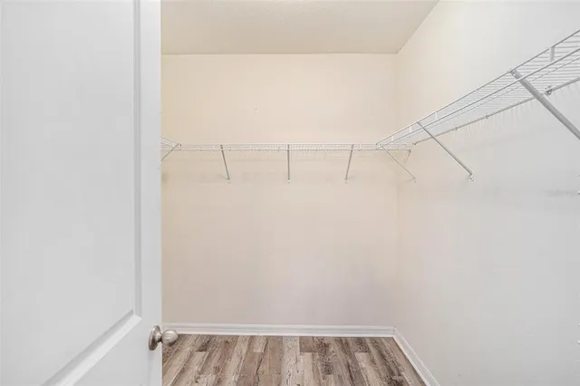 a view of a room with racks on the wall