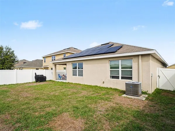 swimming pool view with a seating space