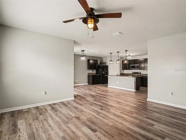 a view of a kitchen with a sink and dishwasher