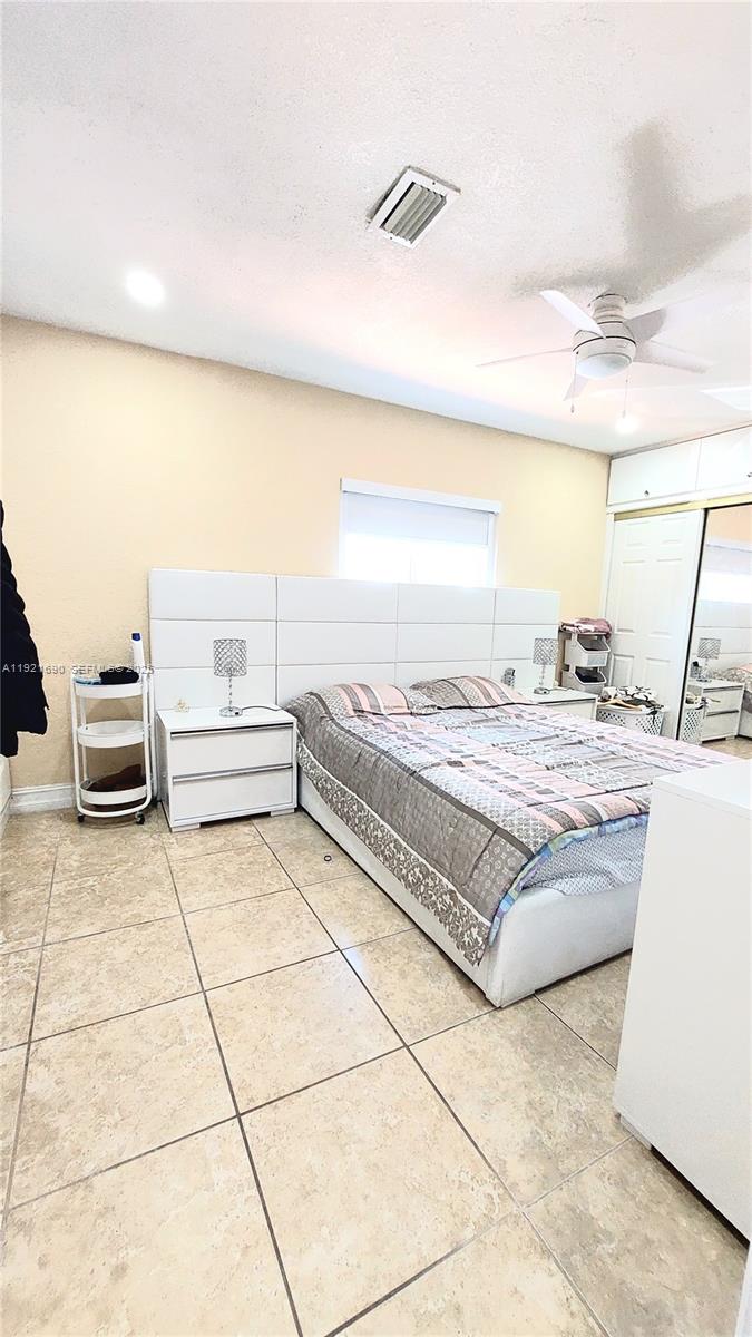 2145 Southwest 76th Avenue Miami, FL 33155 - Photo 15 of 28 a spacious bathroom with a vanity and a bathtub