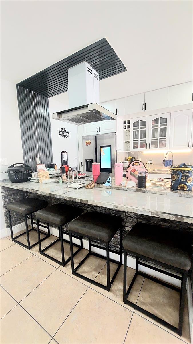 2145 Southwest 76th Avenue Miami, FL 33155 - Photo 21 of 28 a outdoor patio with table and chairs