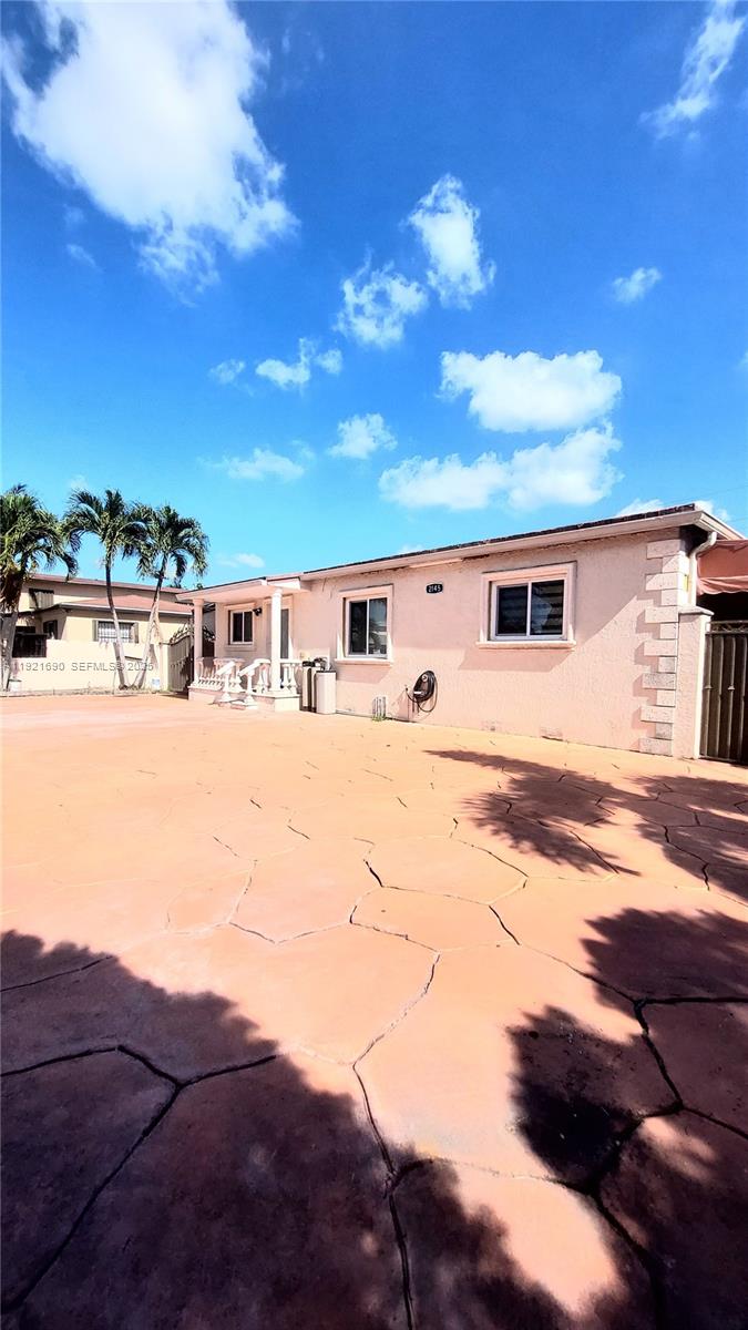 2145 Southwest 76th Avenue Miami, FL 33155 - Photo 4 of 28 a view of houses with outdoor space