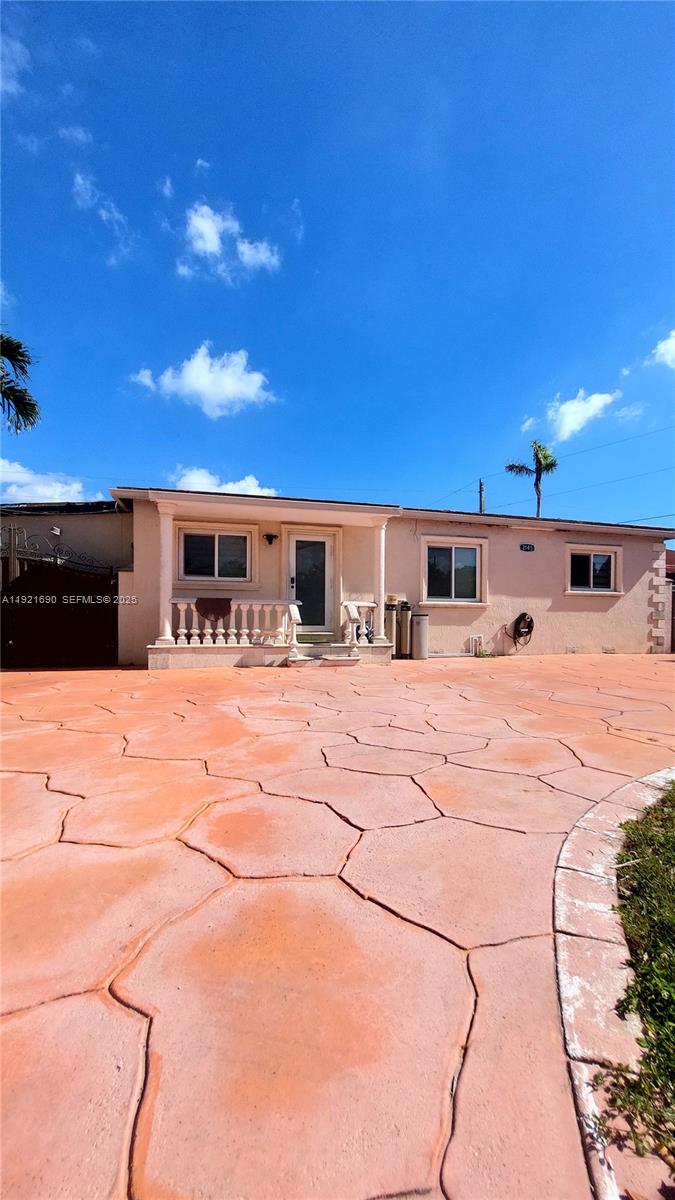 2145 Southwest 76th Avenue Miami, FL 33155 - Photo 6 of 28 a swimming pool with outdoor seating and yard