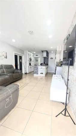 a living room with furniture and a couch