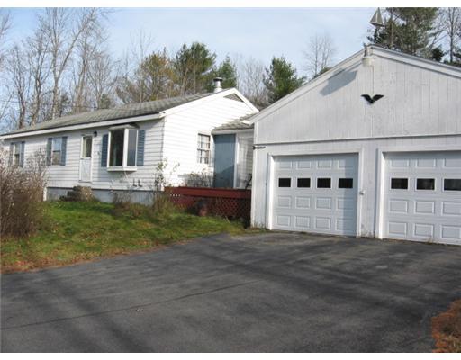 27 Unity Road Benton, ME 04901 - Photo 11 of 12 Exterior Front. 2 car garage plus 1