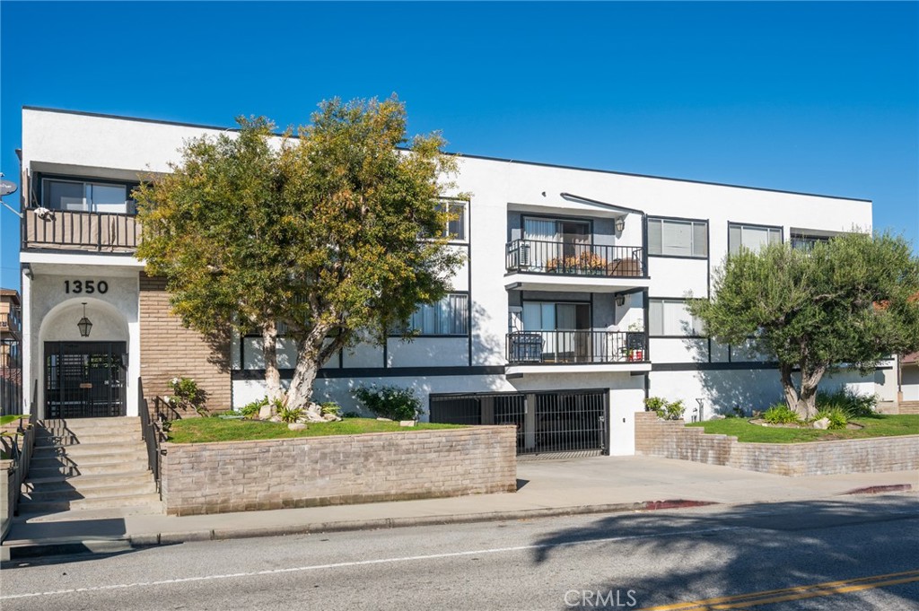 1350 West 9th Street San Pedro, CA 90732 - Photo 1 of 13 a front view of a house with garden