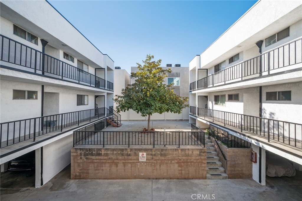 1350 West 9th Street San Pedro, CA 90732 - Photo 9 of 13 a view of a house with a small yard