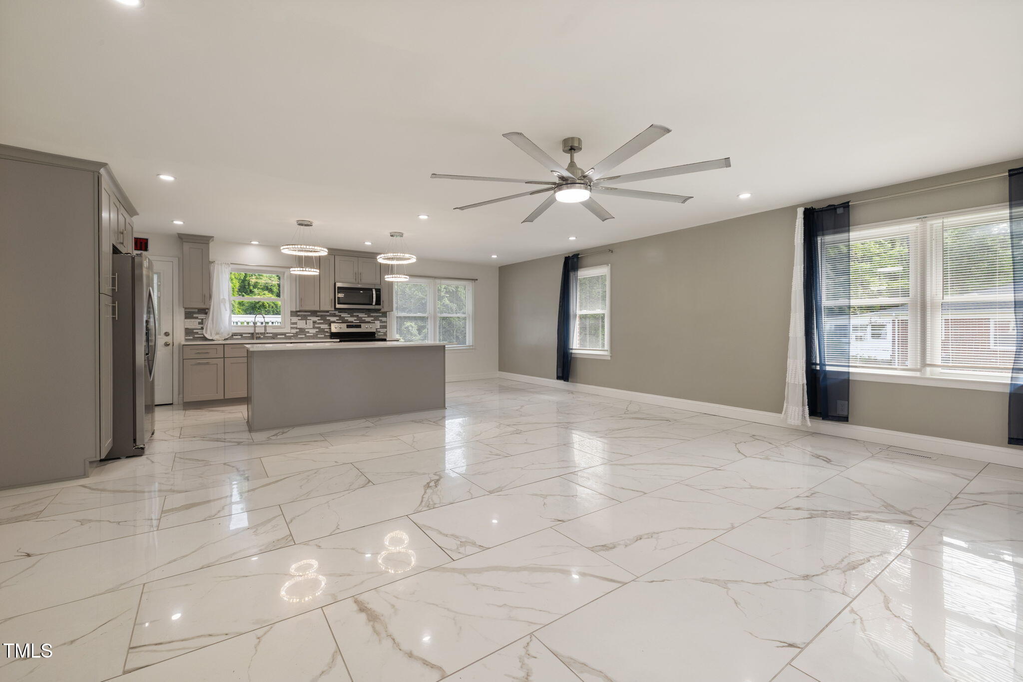 2315 Oxford Road Henderson, NC 27536 - Photo 9 of 62 a view of a kitchen with furniture and a kitchen