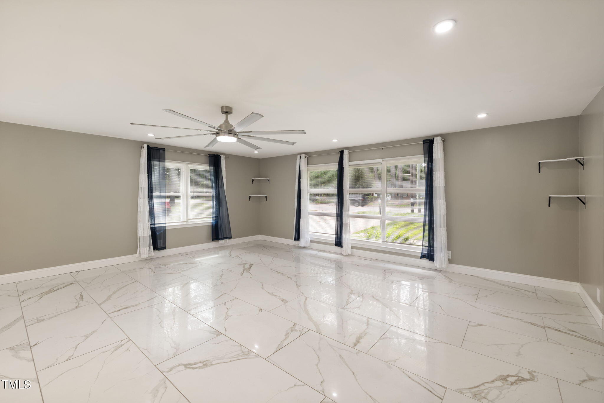 2315 Oxford Road Henderson, NC 27536 - Photo 10 of 62 a view of an empty room with a window