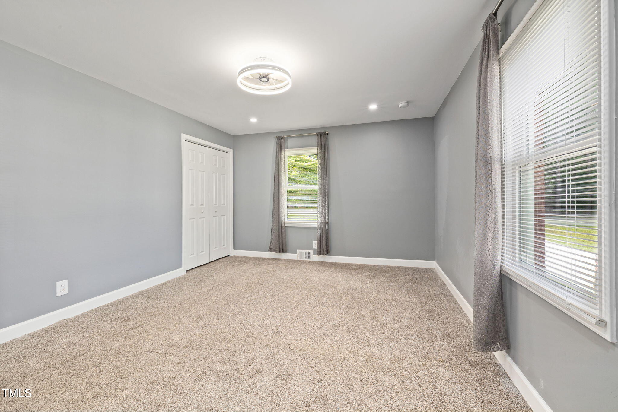 2315 Oxford Road Henderson, NC 27536 - Photo 16 of 62 a view of an empty room with a window