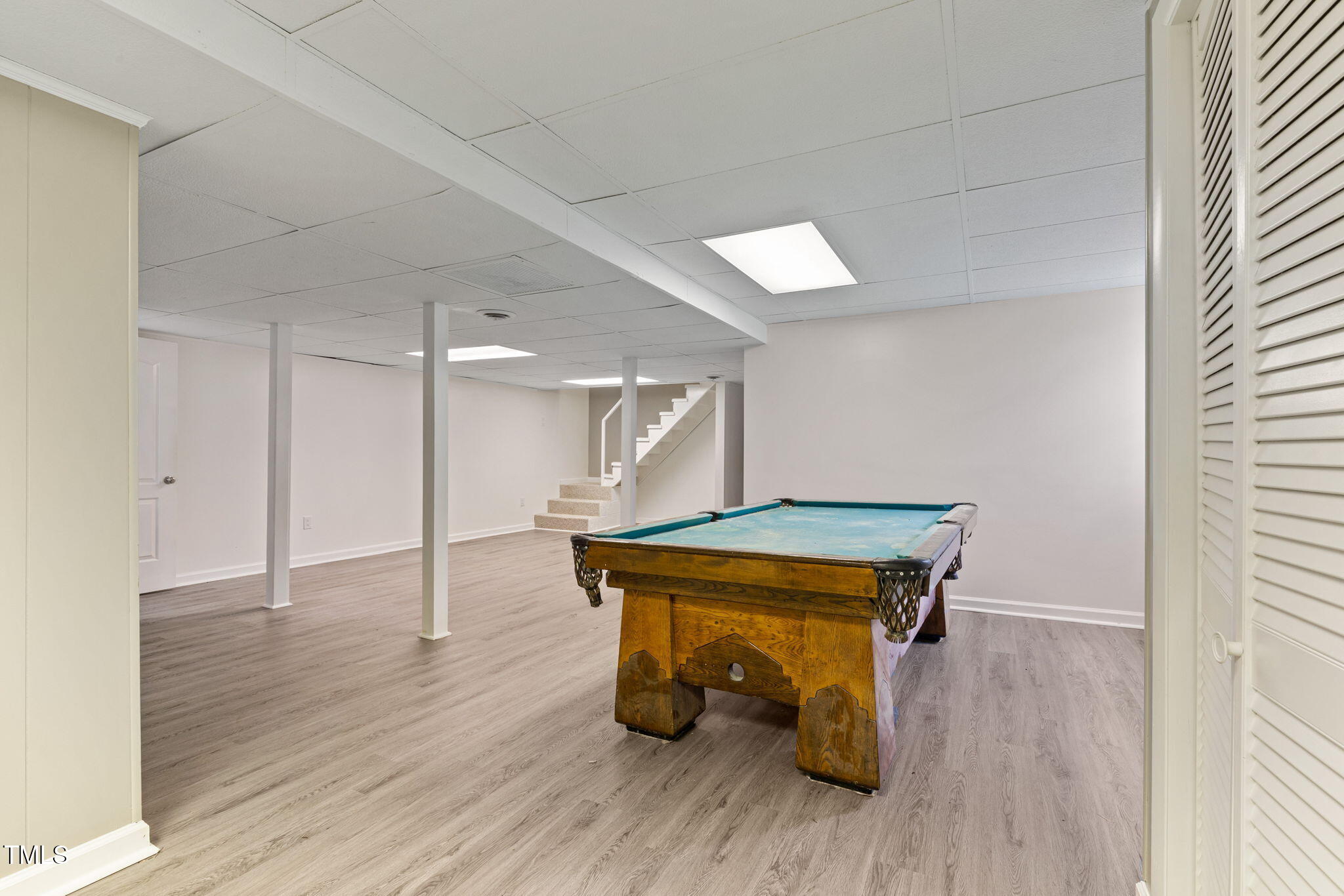 2315 Oxford Road Henderson, NC 27536 - Photo 34 of 62 a room with wooden floors and pool table