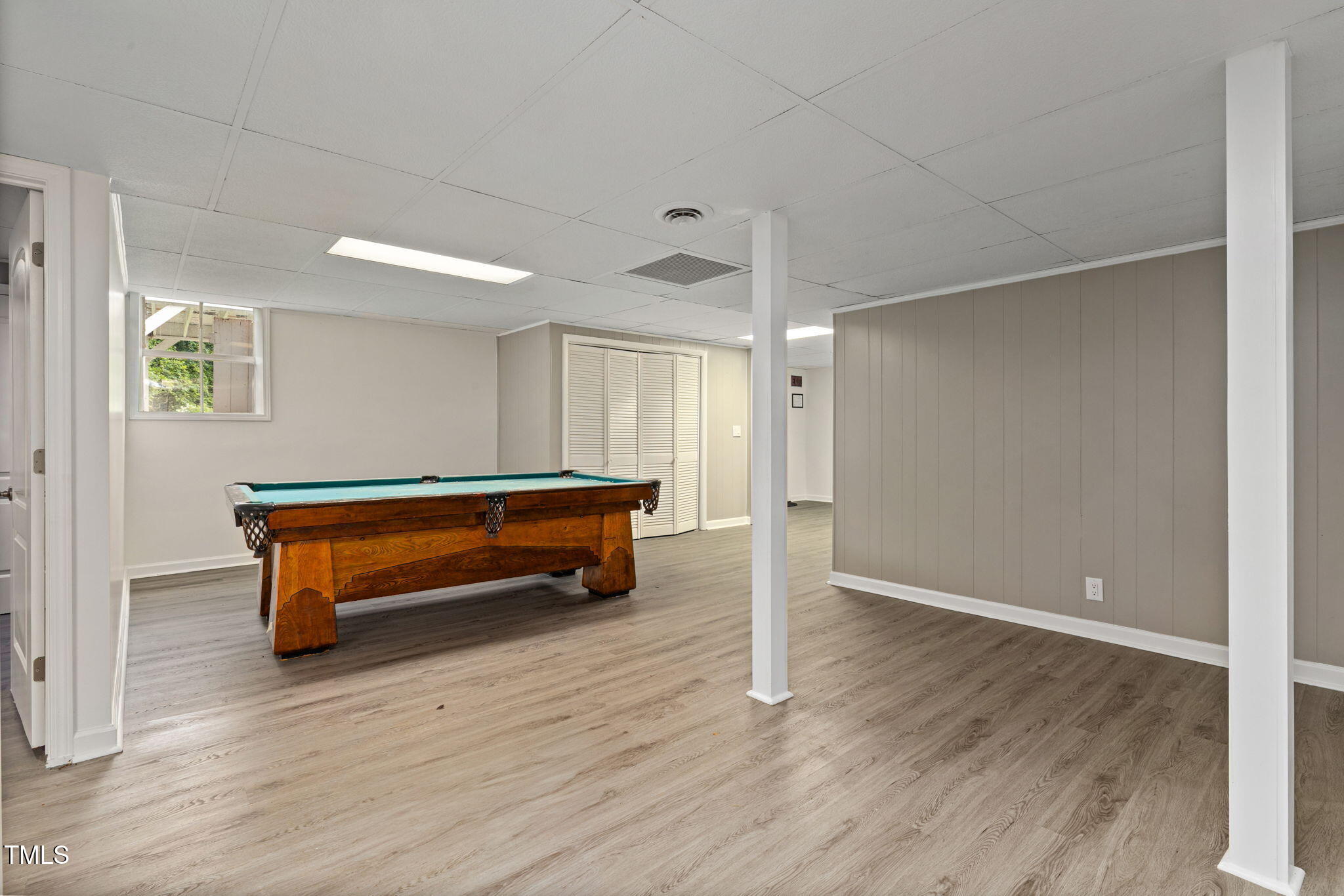 2315 Oxford Road Henderson, NC 27536 - Photo 36 of 62 a room with wooden floor and furniture