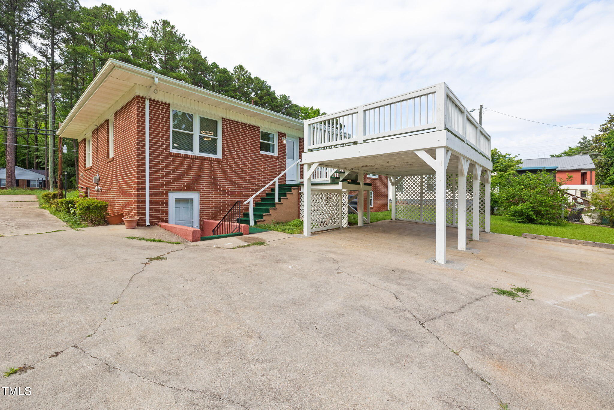 2315 Oxford Road Henderson, NC 27536 - Photo 51 of 62 a view of a house with a park