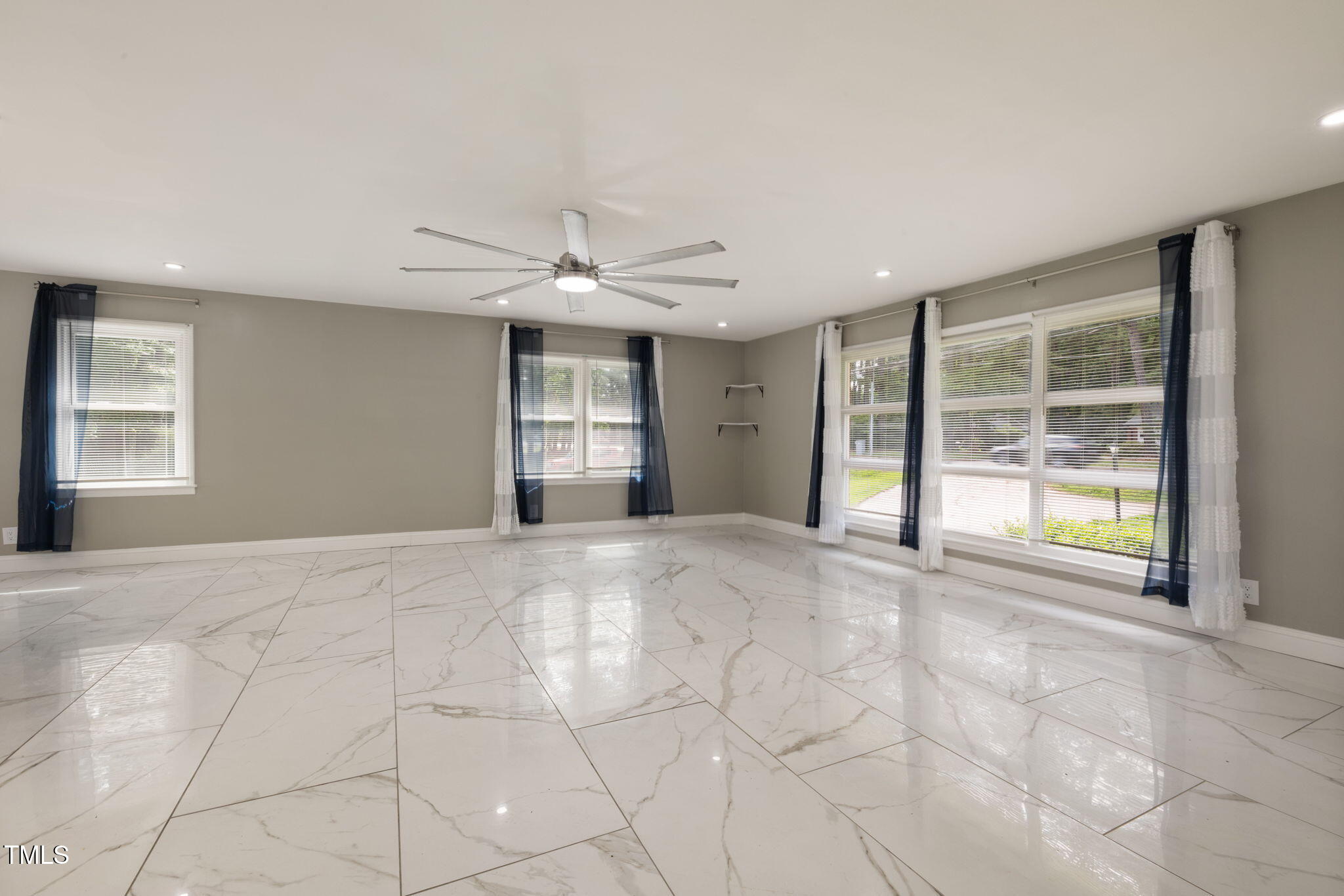 2315 Oxford Road Henderson, NC 27536 - Photo 8 of 62 a view of an empty room with a window