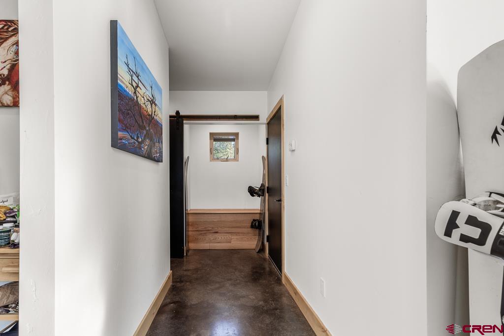 448 Hermosa View Drive Durango, CO 81301 - Photo 20 of 42 a view of a hallway with wooden floor