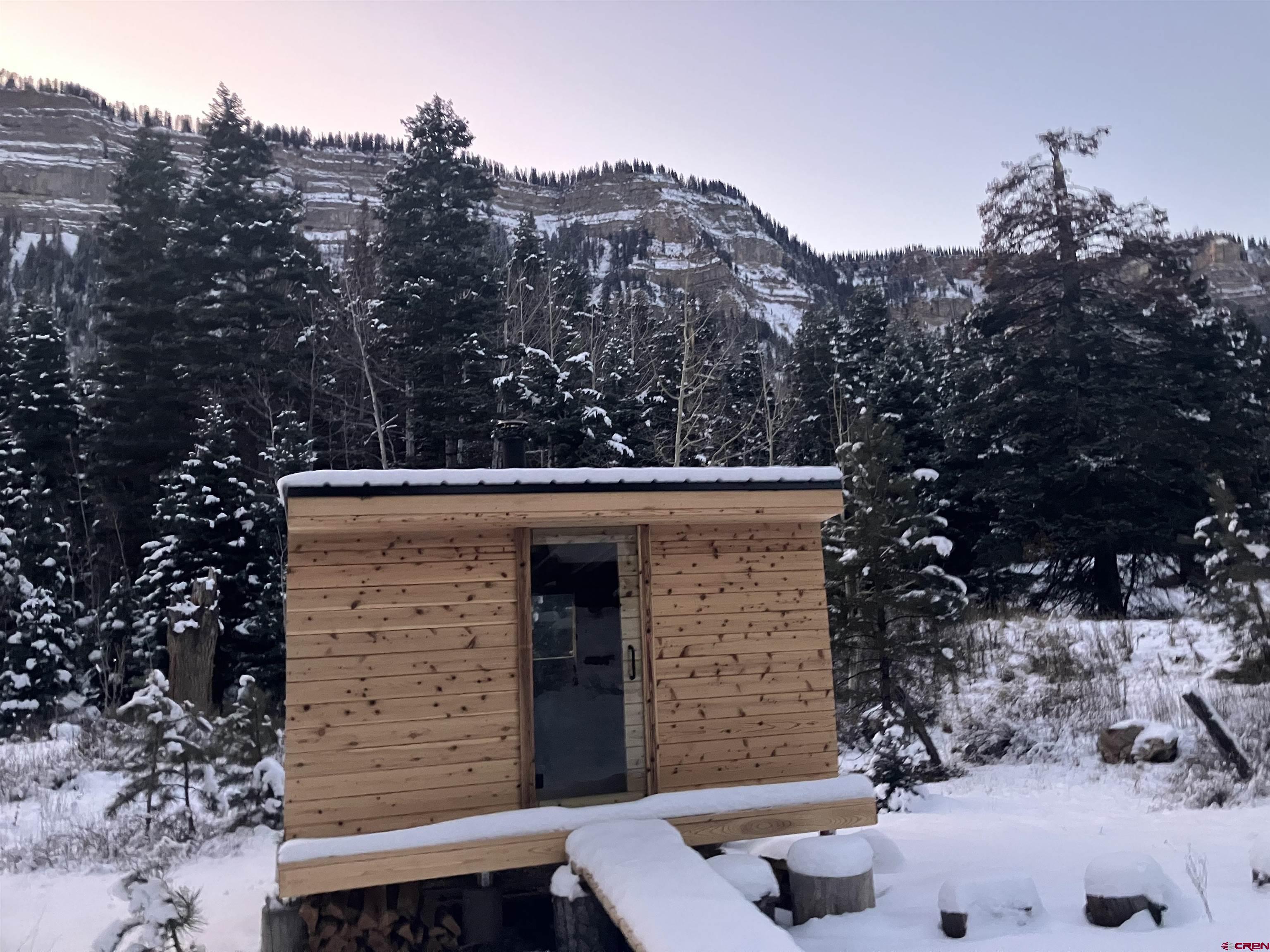 448 Hermosa View Drive Durango, CO 81301 - Photo 33 of 42 a view of a brick house with a yard