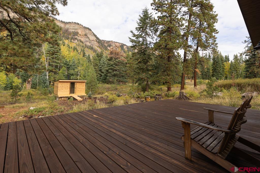 448 Hermosa View Drive Durango, CO 81301 - Photo 34 of 42 a view of a roof deck with wooden floor and fence