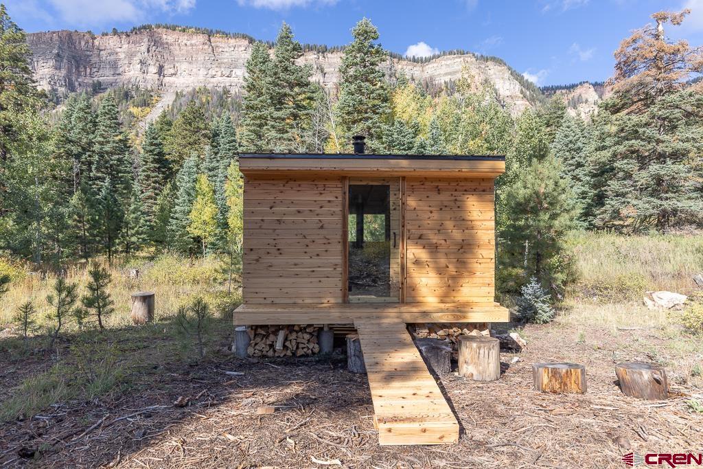448 Hermosa View Drive Durango, CO 81301 - Photo 35 of 42 a view of a small house with a yard