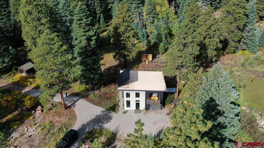 448 Hermosa View Drive Durango, CO 81301 - Photo 40 of 42 a view of a house with a yard and sitting area