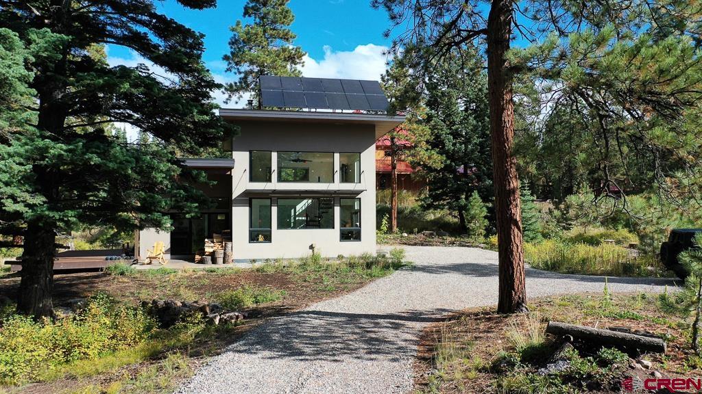 448 Hermosa View Drive Durango, CO 81301 - Photo 4 of 42 a front view of a house with a yard