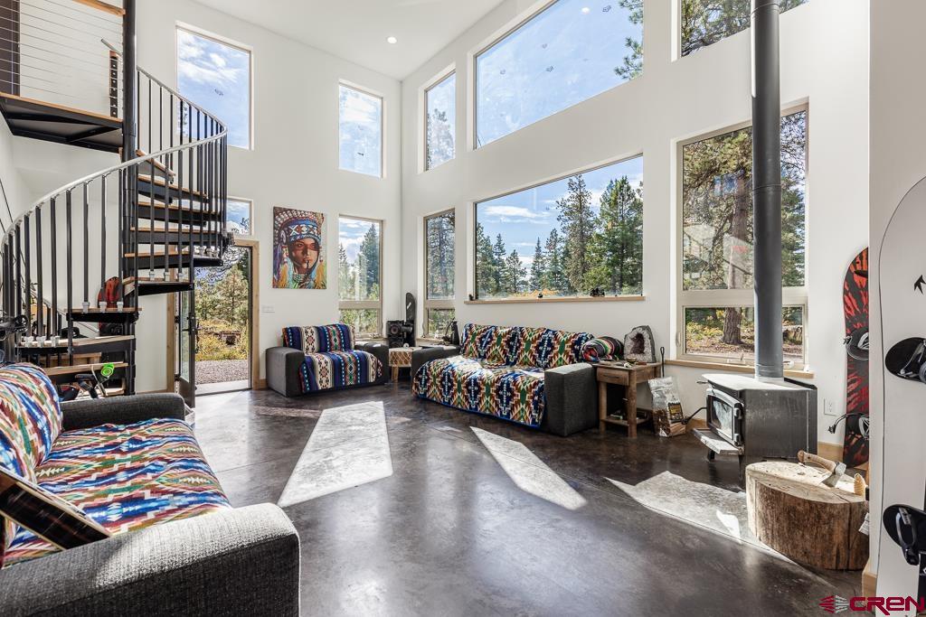 448 Hermosa View Drive Durango, CO 81301 - Photo 5 of 42 a living room with furniture and a large window