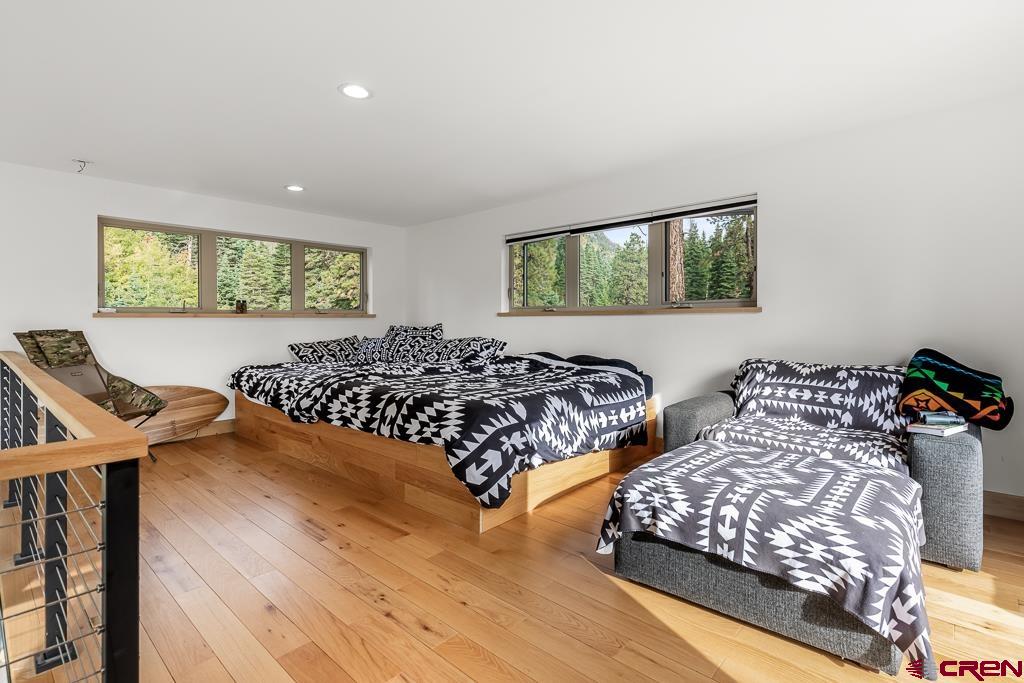 448 Hermosa View Drive Durango, CO 81301 - Photo 8 of 42 a bedroom with two beds and a night stand