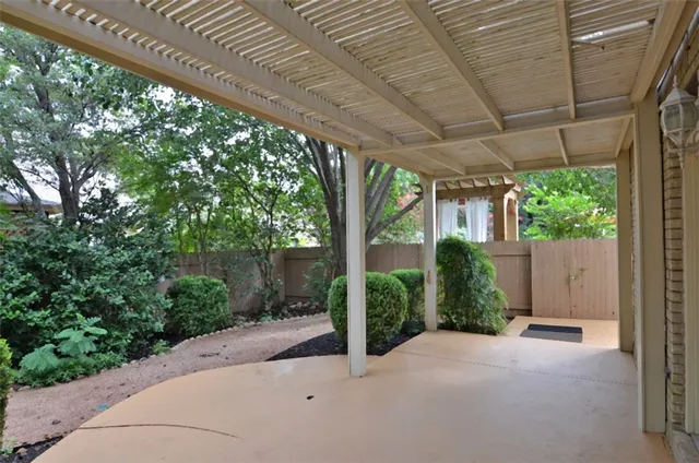 a view of a backyard with garden